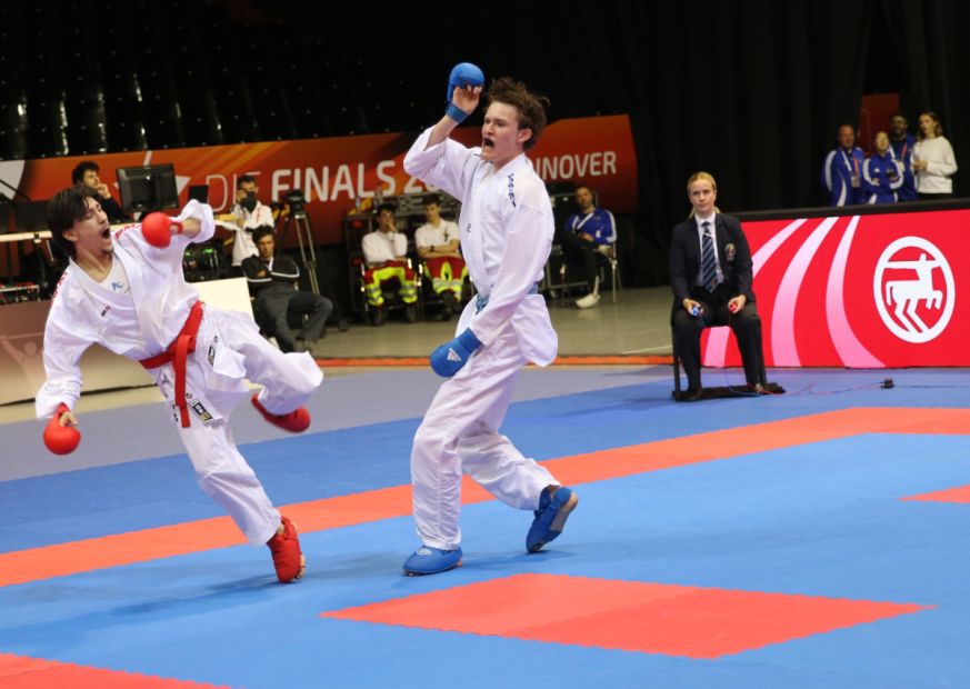 Eric Ridiger (rechts in blau)    Bild: Martina Bier (HFK Pressereferentin)