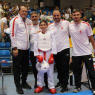 V.l.: Alexander Lang (Landestrainer Kumite Stützpunkt Hessen Nord), Christian Bonsiep (HFK Leistungssportreferent, Leonid Korovyakov (Bronzemedaille), Jamal Laudiai (Landestrainer Kumite Stützpunkt Hessen Süd), Marcel Harisow (Betreuer & Coach)                Bild: Martina Bier (HFK Pressereferentin)